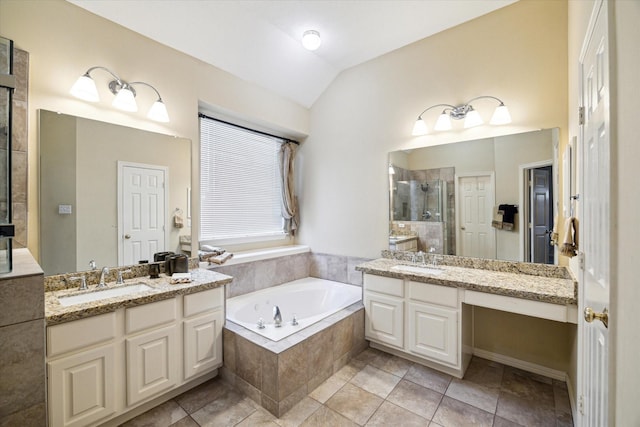 bathroom featuring lofted ceiling, vanity, tile patterned floors, and plus walk in shower