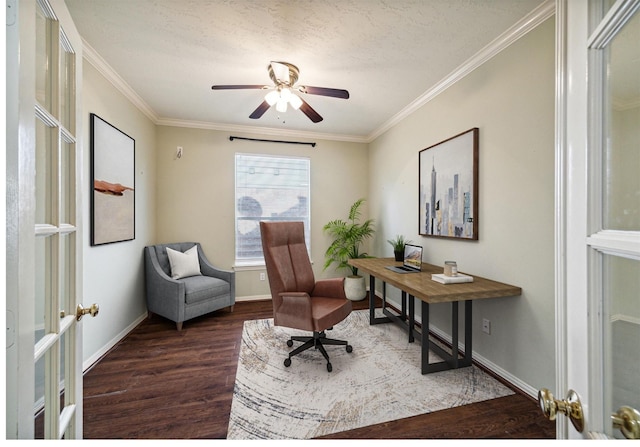 office space with dark wood-type flooring, a textured ceiling, ceiling fan, and ornamental molding