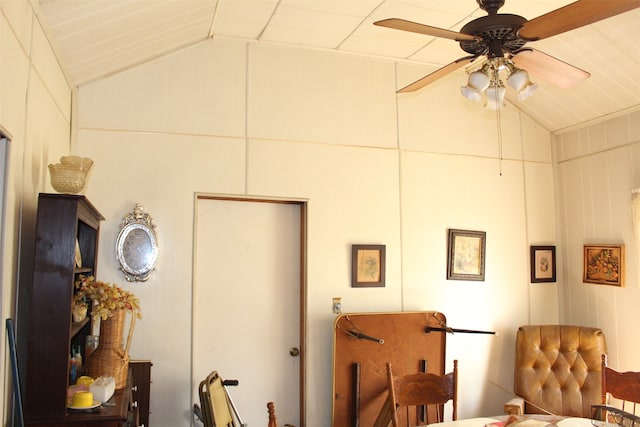 sitting room with lofted ceiling and ceiling fan