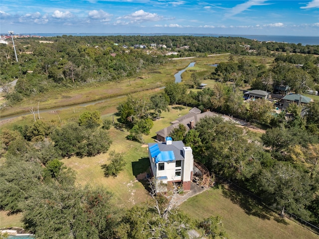 bird's eye view featuring a wooded view