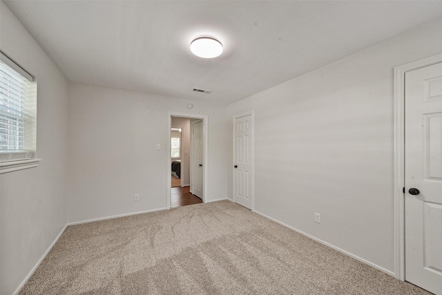 interior space with visible vents and baseboards