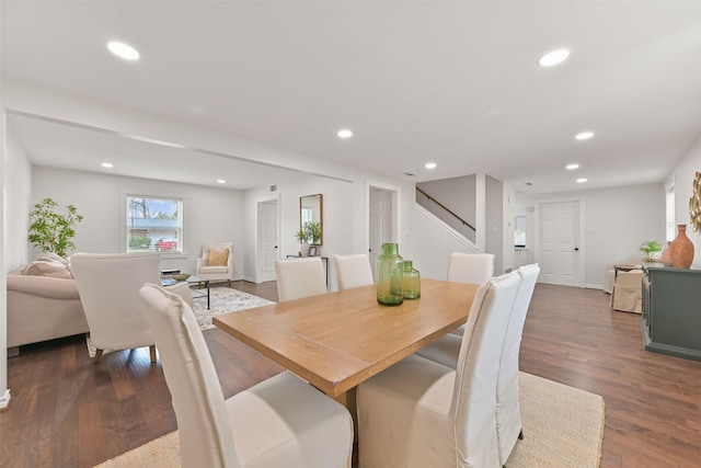 dining area with stairway, wood finished floors, and recessed lighting