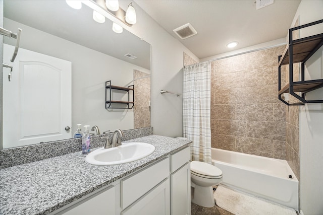 full bathroom featuring toilet, vanity, and shower / bath combination with curtain