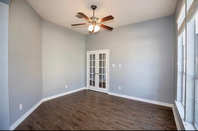 unfurnished room with french doors, dark wood-type flooring, and ceiling fan