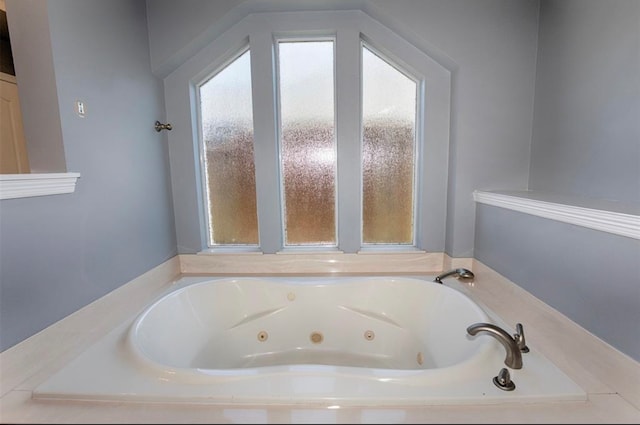 bathroom featuring a washtub