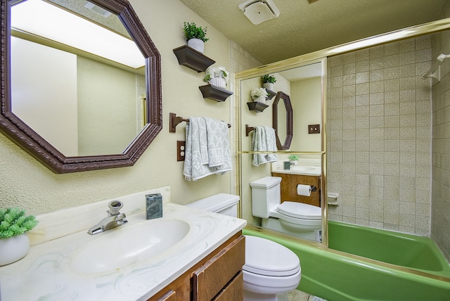 full bathroom with a textured ceiling, vanity, toilet, and bath / shower combo with glass door