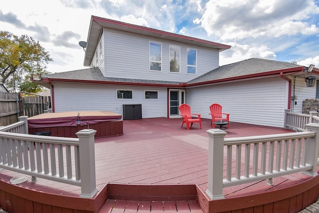 deck featuring a hot tub