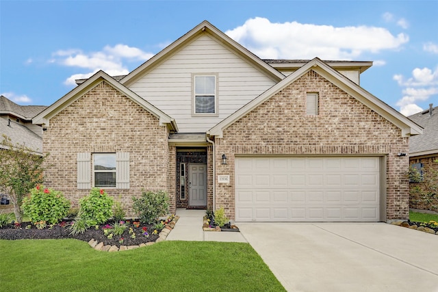 front facade with a front yard and a garage