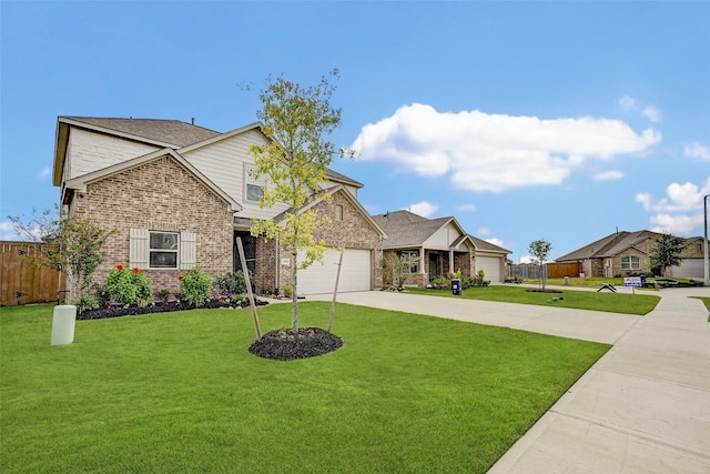 view of front of house featuring a front lawn and a garage