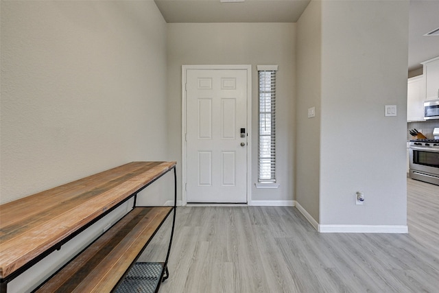 entrance foyer featuring light hardwood / wood-style flooring