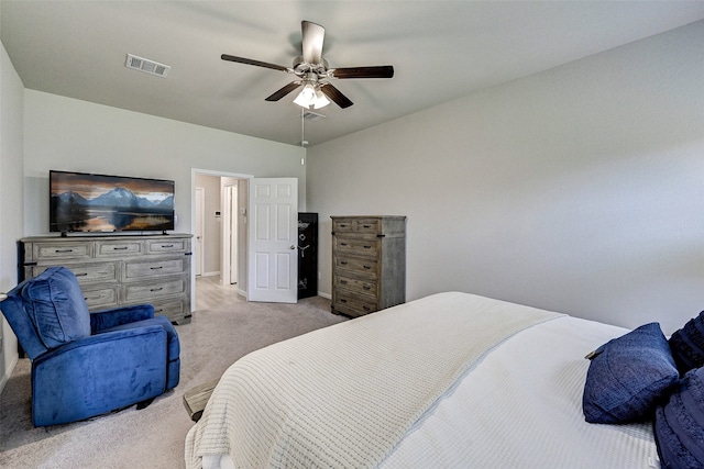 bedroom featuring ceiling fan, light carpet, and lofted ceiling