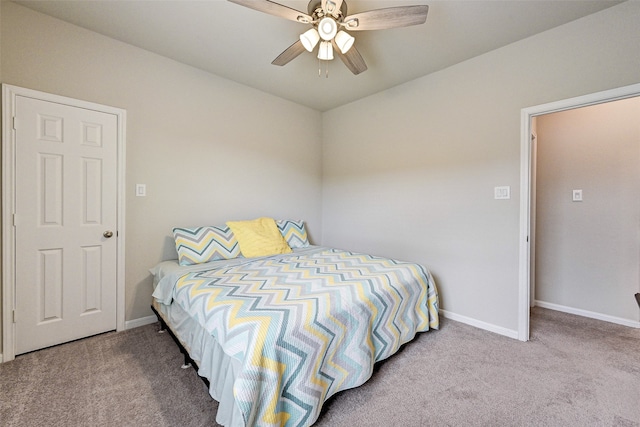 bedroom featuring light carpet and ceiling fan