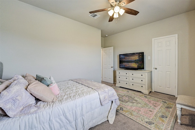 carpeted bedroom featuring ceiling fan