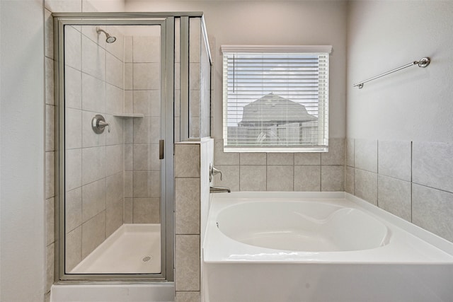 bathroom with independent shower and bath