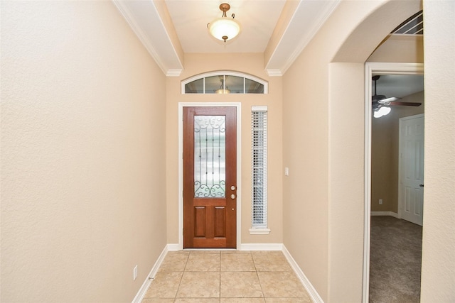 entryway with light tile patterned floors