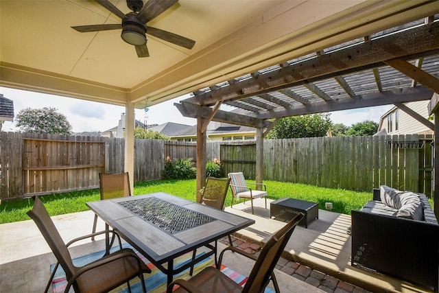 view of patio with ceiling fan, an outdoor living space, and a pergola