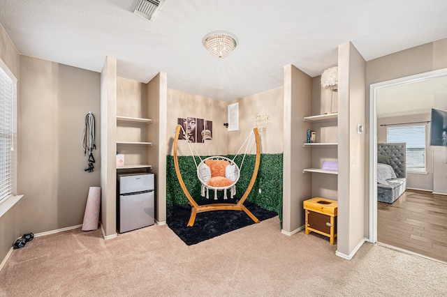 sitting room with light carpet