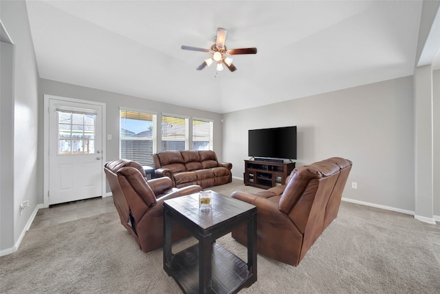 living room featuring lofted ceiling, light carpet, and ceiling fan