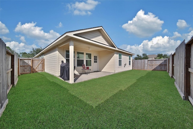 9924 Lace Flower Way, Conroe, TX 77385 - rear view of house featuring a patio