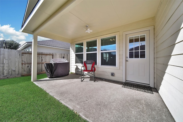 view of patio featuring ceiling fan