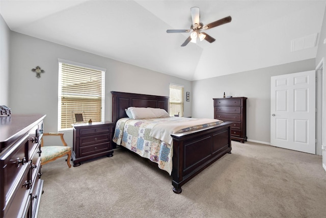 9924 Lace Flower Way, Conroe, TX 77385 - bedroom featuring light carpet, lofted ceiling, a ceiling fan, and baseboards