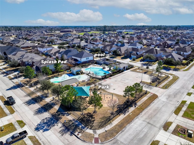 9924 Lace Flower Way, Conroe, TX 77385 - aerial perspective of suburban area with a pool