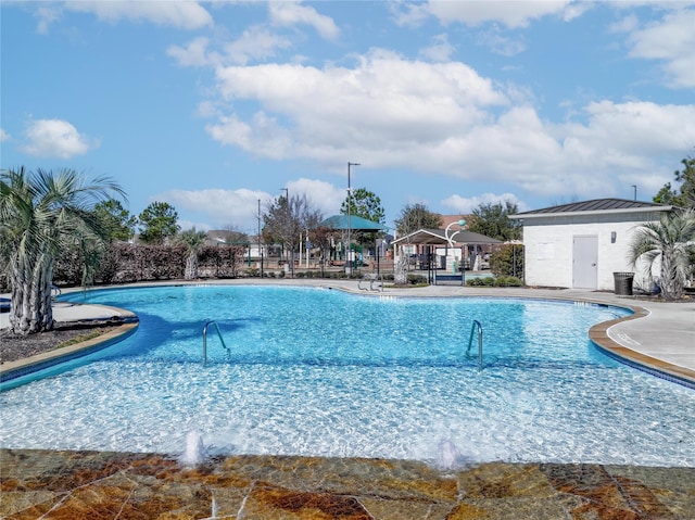 9924 Lace Flower Way, Conroe, TX 77385 - community pool featuring a patio area