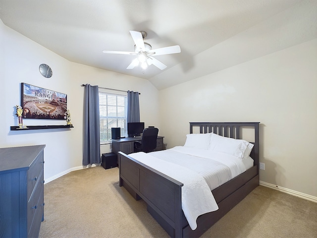 carpeted bedroom with lofted ceiling and ceiling fan