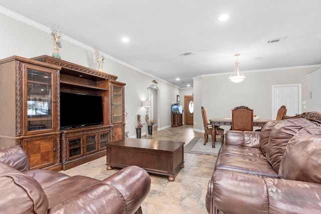 631 Apache St, Houston, TX 77022 - living area with crown molding, recessed lighting, light stone finish floors, and baseboards
