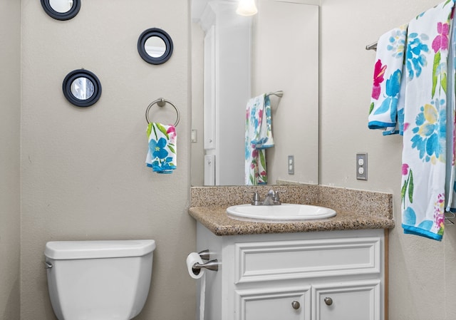 631 Apache St, Houston, TX 77022 - bathroom with vanity and toilet