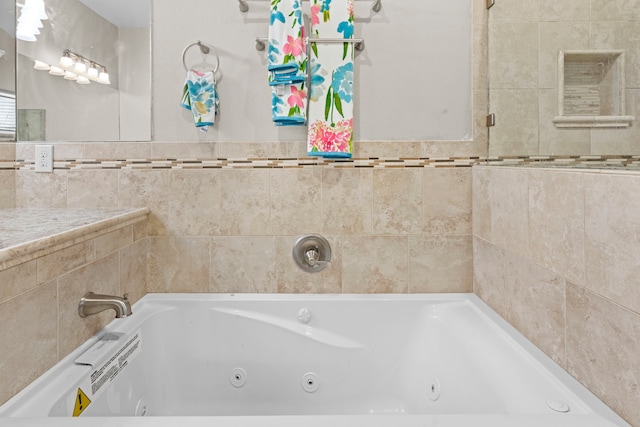 631 Apache St, Houston, TX 77022 - bathroom with a whirlpool tub