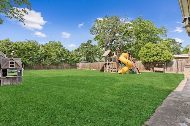 631 Apache St, Houston, TX 77022 - view of yard featuring a playground
