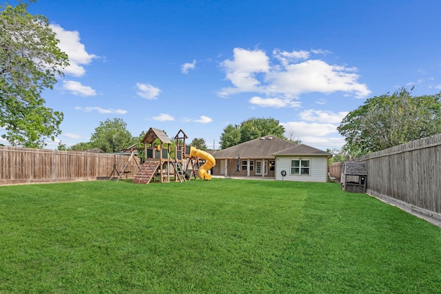 view of yard with a playground