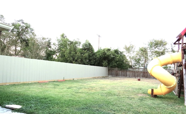 view of yard featuring a playground