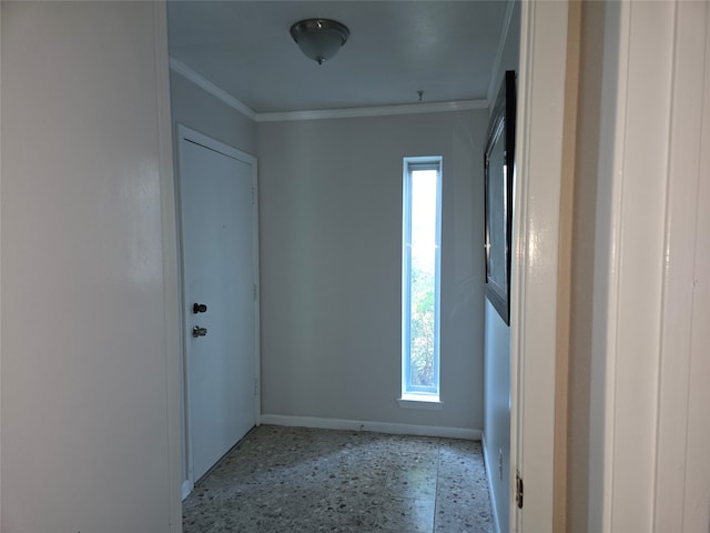 unfurnished room with ornamental molding