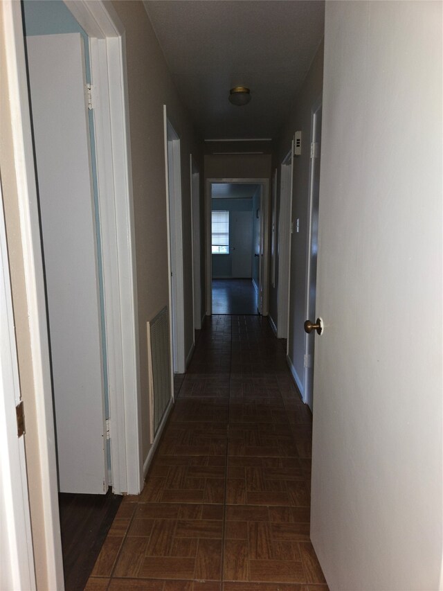 hall featuring dark hardwood / wood-style floors