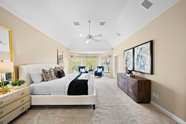 bedroom with lofted ceiling, light colored carpet, and ceiling fan