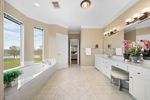 ensuite bathroom featuring a garden tub, visible vents, crown molding, vanity, and connected bathroom