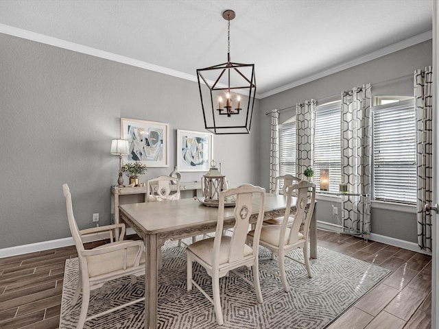 dining space with ornamental molding, dark wood-type flooring, and an inviting chandelier