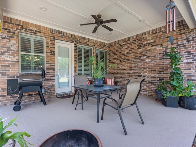 view of patio featuring ceiling fan