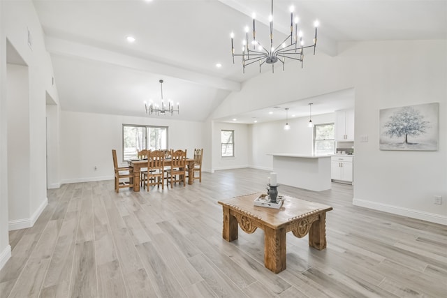 living room featuring beamed ceiling, a chandelier, high vaulted ceiling, and light wood-type flooring