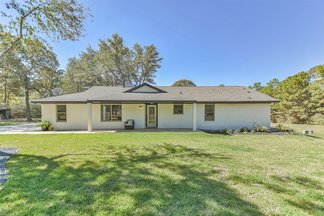 single story home with a front yard