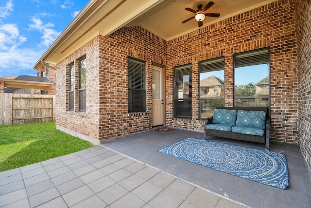 view of patio / terrace featuring ceiling fan