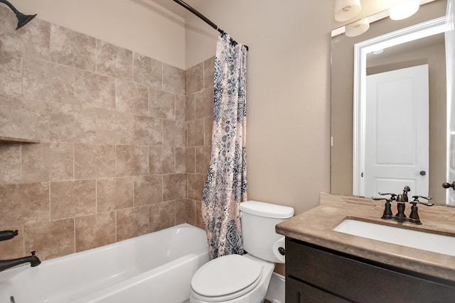 full bathroom with vanity, toilet, and shower / bath combo with shower curtain