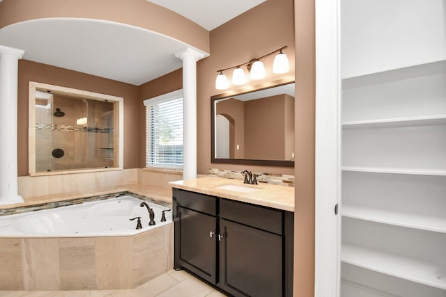 bathroom featuring vanity, decorative columns, separate shower and tub, and tile patterned flooring