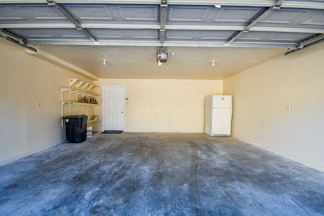 garage with white refrigerator