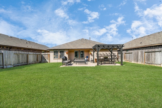 rear view of property with a lawn, a patio, and a pergola