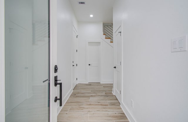 hallway featuring light wood-type flooring