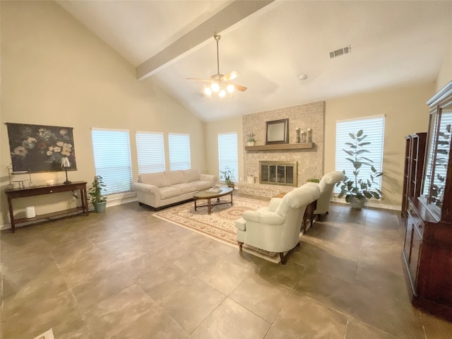 living room with beamed ceiling, a fireplace, high vaulted ceiling, and ceiling fan