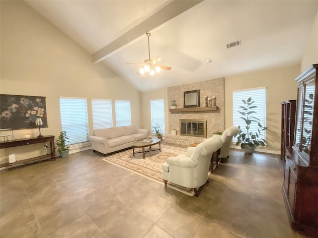 living room featuring beam ceiling, ceiling fan, high vaulted ceiling, and a brick fireplace